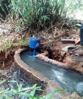 20kW Axial Flow Hydroelectric Generator for Home Power 220V Genny installed near river stream, pure copper core visible.