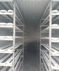 Inside view of the Built Tough Off Grid Modular Cold Room And Walk In Freezer System featuring shelving for food storage.