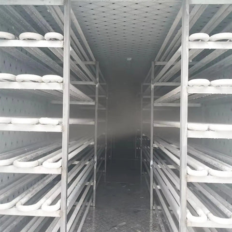 Inside view of the Built Tough Off Grid Modular Cold Room And Walk In Freezer System featuring shelving for food storage.