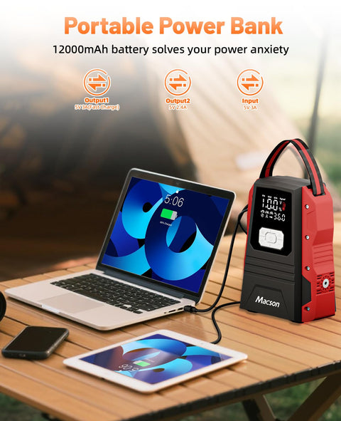 All In One Jump Starter With Air Compressor Portable 12V Battery Pack for 9 Liter Gas and 8 Liter Diesel Engines next to laptop