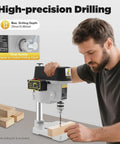 Compact Mini Benchtop Drill Press With Variable Speed Control Up To Sixteen Grand and Quick Change Collar for Power Drills in use.
