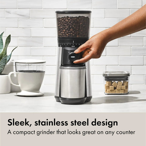 Hand adjusting Barista Grade Conical Burr Electric Coffee Grinder with 12 oz capacity in stainless steel.