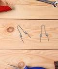 Upgrade Your Trash Can With This Heavy Duty Stainless Steel Dual Torsion Spring Kit For Smooth Automatic Lid Closure And Easy DIY Household Bin Repair With High Elasticity 4 Coil Design. stainless steel dual torsion springs on wood