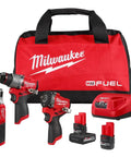 M12 Fuel Badass Three Tool Power Combo Kit Featuring Ultra Compact Drill Driver With Robust All Metal Gears And Smart Thermal Protection designed for heavy duty tasks and stored in a red tool bag.