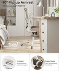Ergonomic Desk Chair With Adjustable Lumbar Support And Flip Up Armrests In Breathable Mesh For All Day Comfort At Home Or In The Office Khaki Color S Shaped Back Height And Tilt Adjustability in a home office setting