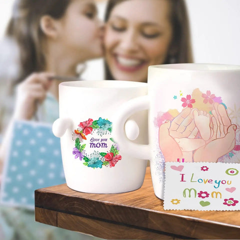 Mugs with floral and hand designs on Clear Waterslide Decal Paper For Laser Printers, 8.5x11, 25 Sheets, for easy customization.