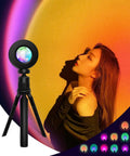 Sunset Lamp Projector With Remote 13 Color Multicolor Night Light casting vibrant glow on woman's silhouette in aesthetic photo
