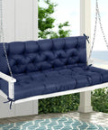 Blue Memory Foam Porch Swing Cushion For Outdoor Patio 60 Inch By 40 Inch Two To Three Seater With Headrest installed on white swing