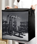 Person holding 70L Gym Equipment Storage Bag With Zippers And Handle, Extra Large Bedding And Comforter Organizer, fabric material