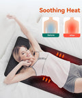 Woman relaxing on Full Body Massage Pad For Bed with 10 Vibration Motors and 5 Massage Modes, Heated Mattress Pad for Back and Whole Body.