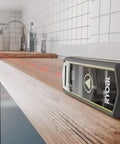 Pro 20 Meter Laser Distance Meter With Clear Digital Screen And Continuous Measurement Mode on wooden surface showing 1.82m distance.