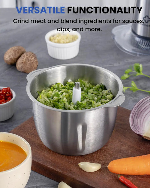 Stainless steel bowl with chopped vegetables for the 6 Cup Mini Food Processor Chopper With 250W Motor And Stainless Steel Blades Plus Meat Grinder Attachment For Meat Veggies Onion Garlic Nuts Sauces Ice And Baby Food In A Compact 1.5L Kitchen Processor on a kitchen counter.