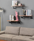 Beefy Wall Hanging Shelf Brackets Set Of 6 Heavy Duty Rustic Black Metal Pipe Brackets For DIY Open Shelving Floating Shelves Supports Farmhouse Home Decor in living room with books and statues displayed.