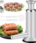 Two In One Sausage Stuffer And Meatball Maker Stainless Steel Manual Press with dishes of sausages and meatballs