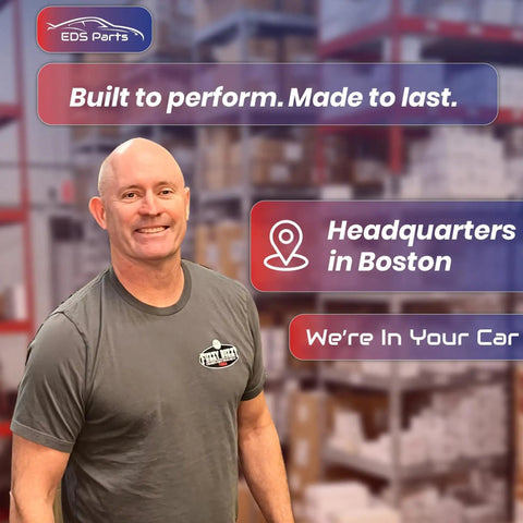 EDS Parts representative in a warehouse, smiling, wearing a gray shirt for automotive components.