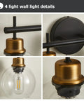 Close-up of Black And Gold 4 Light Vanity Lights with Clear Globe Shade for Farmhouse Modern Bathroom Over Mirror details.