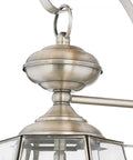 Close-up of Newbury 20 Inch Outdoor Wall Lantern, pewter finish, clear beveled glass, Old World French Country charm.