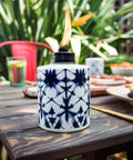 Tie Dye Glass Tabletop Torches 3 Pack For Outdoor Patio, Backyard And Garden Lighting, Portable Citronella Table Torches In Blue, 5.75 Inch, Fiberglass Wicks With Metal Snuffer For Easy Flame Control on patio table