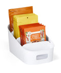 Smart 4 Tier Stairstep Packet Organizer With Divided Compartments For Kitchen Pantry And Counter, holding seasoning packets.