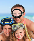 Man and children wearing Wide Field Diving Mask For Snorkeling And Spearfishing With Anti Fog Silicone Goggles enjoying beach