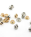 Must Have Reinforced Grommet Kit Set For DIY Projects 200 Pieces With 3 By 16 Inch Brass Eyelets scattered on white surface