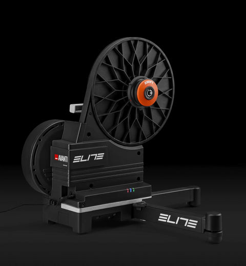 Avanti Zwift Ready Direct Drive Bike Trainer With Virtual Shifting One Percent Power Accuracy WiFi And Bluetooth 2100 Watt Max Eighteen Percent Climb Simulation Cog And Click Included Silent Gear Shifting Built For Real World Rides Pro Grade on a black background