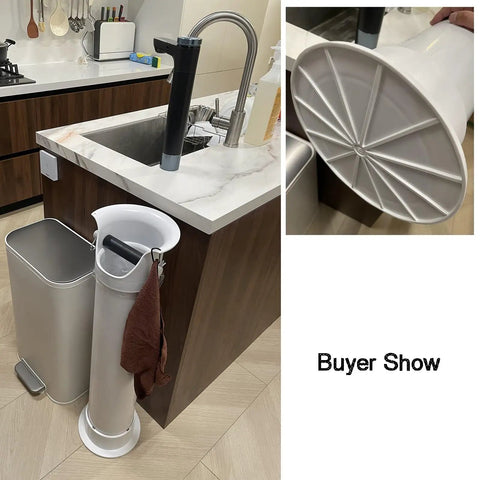 Heavy Duty Espresso Knock Box With Quick Release Drip Tray And Premium Barista Towel near a kitchen sink with a brown towel hanging on it.