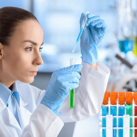 Scientist using 120 Pcs Plastic Test Tubes With Rack 16 By 100Mm Tubes With Caps 60 Hole Rack for experiments in lab