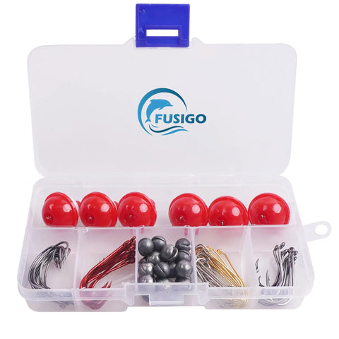 80 Piece Beginner Fishing Tackle Kit With Bobbers Hooks Sinkers And Weights In A Handy Portable Tackle Box For Freshwater And Saltwater Fishin And Trout Bass Panfish Catfish in open box showing compartments with red bobbers, hooks, sinkers.