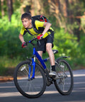 Young cyclist rides bike with Heavy Duty 24x1 3/8 Inner Tubes 37-540 With AV32mm Schrader Valve Two Pack Built To Take A Beating