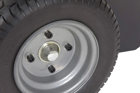 Close-up of Heavy Duty Electric Powered Tugger tire, sturdy design for moving heavy trailers and carts at airports.