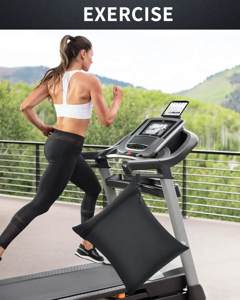 Woman exercising on treadmill with Waterproof Wet Bags Three Pack For Diapers Beach Pool Gym Swimsuits Food Storage And Wet Clothes