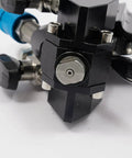 Close-up of Heavy Duty Polyurethane Foam Spray Gun With Air Purge Self Cleaning Pu Foaming Tool cast iron frame and nozzle.