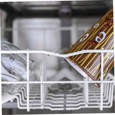 50 Piece Flexible Dishwasher Rack End Covers Tough Vinyl Caps For Prong Guard in a dishwasher with glasses and cups.