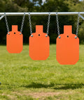 Three neon orange 7 By 12 Inch AR500 Steel Targets, Three Eighths Inch Thick Gong Silhouette, hanging outdoors on a frame.