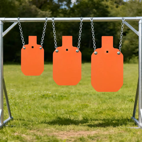 Three neon orange 7 By 12 Inch AR500 Steel Targets, Three Eighths Inch Thick Gong Silhouette, hanging outdoors on a frame.