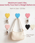 Hella Cute 10 Pack Heart Wall Hooks Super Sturdy Adhesive Mount with bag and keys, colorful heart designs in use.
