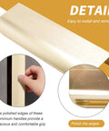 Close-up of Five-Piece No-Fuss Invisible Edge Finger Tab Pulls Set with Brushed Gold Edge, showing detail and polished edges