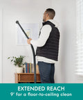 Person using Wet Dry Canister Vacuum Cleaner 3.2 Gallon With 2.5 Peak HP Motor for ceiling cleaning with extension wand