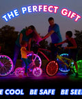 Family enjoying nighttime ride with Two Tire Pack LED Bike Wheel Lights With Batteries Included For 100 Percent Brighter Visibility In Purple