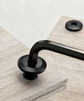 Solid As A Rock 304 Stainless Steel Black Binding Post Screws M5 Hex Drive Rivet Socket Pack With Allen Wrench on wood.