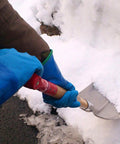 Person shoveling snow wearing Temres 282 Waterproof Insulated Winter Work Gloves With Breathable Polyurethane Coating And Thermal Fleece Liner High Grip For Hiking Cold Storage Ice Fishing And Outdoor Labor Workhorse Quality