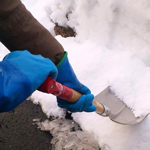 Person shoveling snow wearing Temres 282 Waterproof Insulated Winter Work Gloves With Breathable Polyurethane Coating And Thermal Fleece Liner High Grip For Hiking Cold Storage Ice Fishing And Outdoor Labor Workhorse Quality