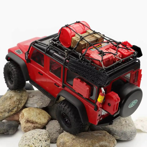 Red RC crawler with Dope Realistic RC Crawler Accessory Kit For 1/24 And 1/18 Scale Rigs on roof, including luggage net, fuel tanks.