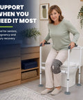 Rock Solid Toilet Safety Rail For Seniors With Heavy Duty Adjustable Steel Frame And A Darn Sure 330 Pound Capacity For Easy Bathroom Transfers And Dependable Home Support. Woman using toilet safety rail.