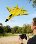 Man flying yellow foam remote control plane in park, illustrating Easy To Fly Foam Remote Control Airplane For Beginners And Adults.