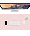 Pink Desk Pad 30x14 Inch PU Leather Desk Mat Waterproof Non Slip Ultra Thin XL Extended Mouse Pad on desk with monitor