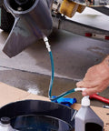 Grease Monkey Go To Fluid Pump For Standard Quart Bottles 4 Cc Per Stroke Transmission Fluid Extractor in use with gear oil.