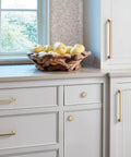 Installed Champagne Bronze Cabinet Pull From Blackrock Collection For Cabinets And Furniture With 11 Inch Overall Length And About 10 Inch Center To Center Mounting By Amerock on kitchen cabinets