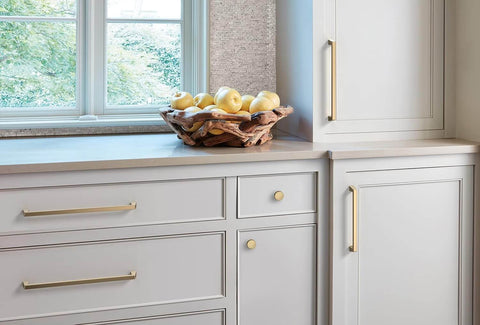 Installed Champagne Bronze Cabinet Pull From Blackrock Collection For Cabinets And Furniture With 11 Inch Overall Length And About 10 Inch Center To Center Mounting By Amerock on kitchen cabinets